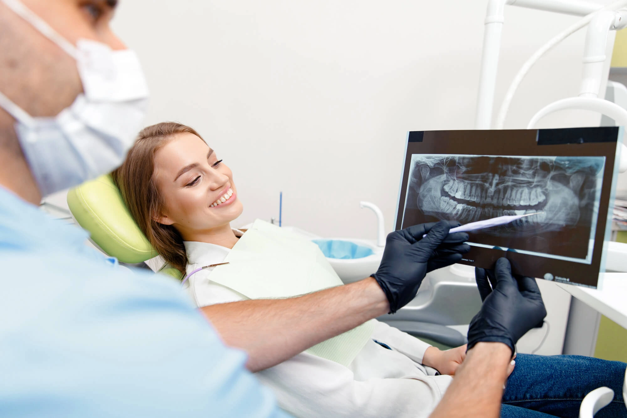 Patient-looking-at-her-xray-in-sf-dental-implants-center 